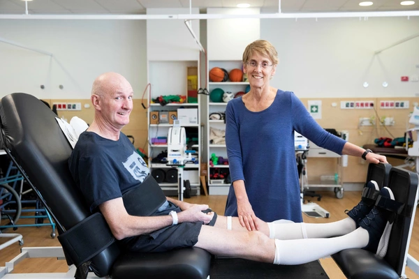 Neuroscientist Lisa Harvey asseses a patient